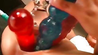 Hot girl fucks four dildos all at once