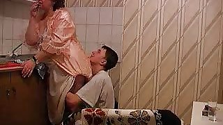 Granny gets fucked in kitchen by her..