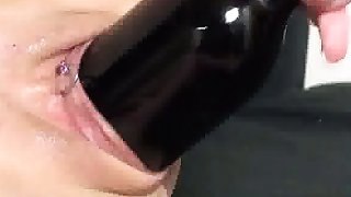 Amateur slut devours a wine bottle and..